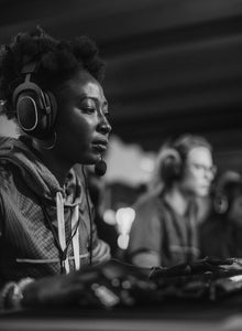 A woman actively engaged in an esports competition.